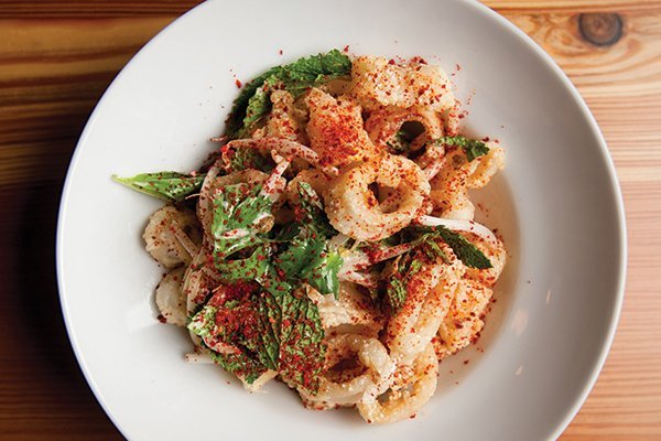 Big flavors wow in the Rice-Dusted Point Judith Calamari at Crave Fishbar in New York—Thai miso, mung bean sprouts, mint, cilantro, Thai basil and Aleppo chile. - See more at: https://www.getflavor.com/seafoods-new-allure/#sthash.41dqCIj7.dpuf