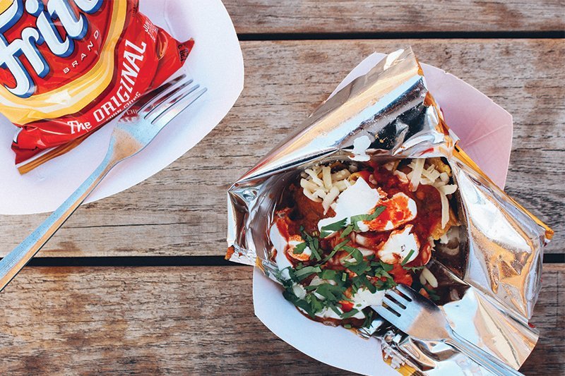 It’s a party in a bag: Chicago’s Big Star features “Walking Tacos,” with corn chips, pinto bean dip, queso Chihuahua, crema, chile sauce and cilantro. Cheese, of course, is essential party food.