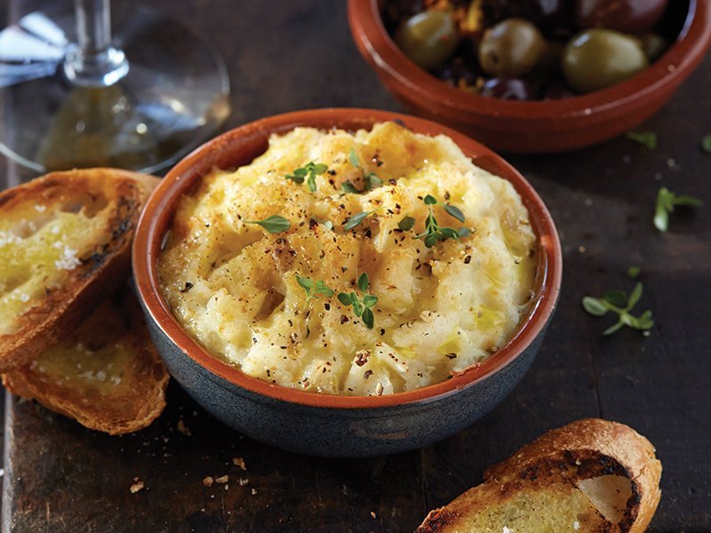 The shift to more shareable seafood formats means diners are free to sample and experiment. A cod brandade invites scooping when served with warm olives and grilled bread.