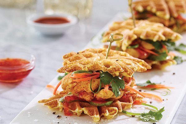 Creative formats and global cues enable operators to deliver high-impact flavor with protein, as with these Vietnamese-inspired chicken and waffle sliders with nuoc cham sauce.