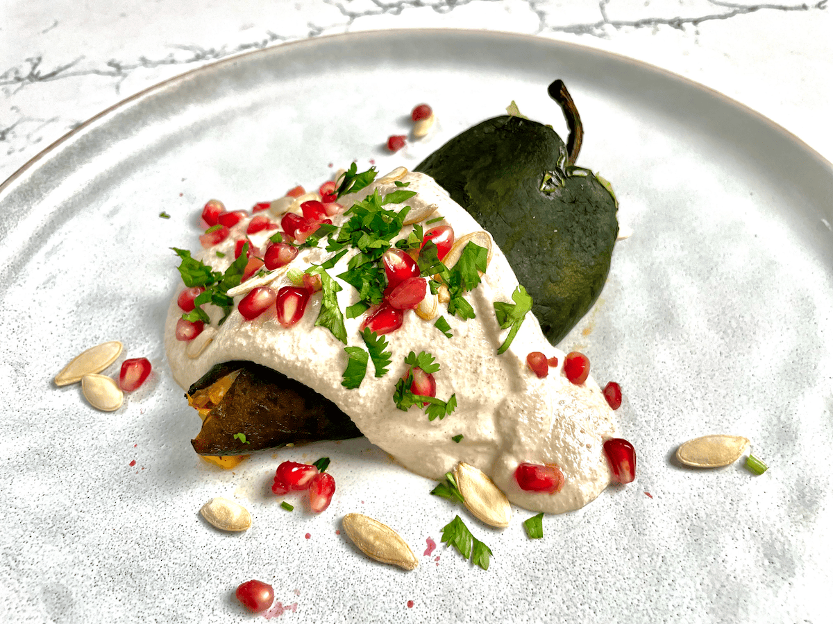 Mexico’s national dish, chiles en nogada, finds the perfect, creamy base in requeson cheese. Switch up the formula by swapping in fresh pomegranate arils for dried fruit.