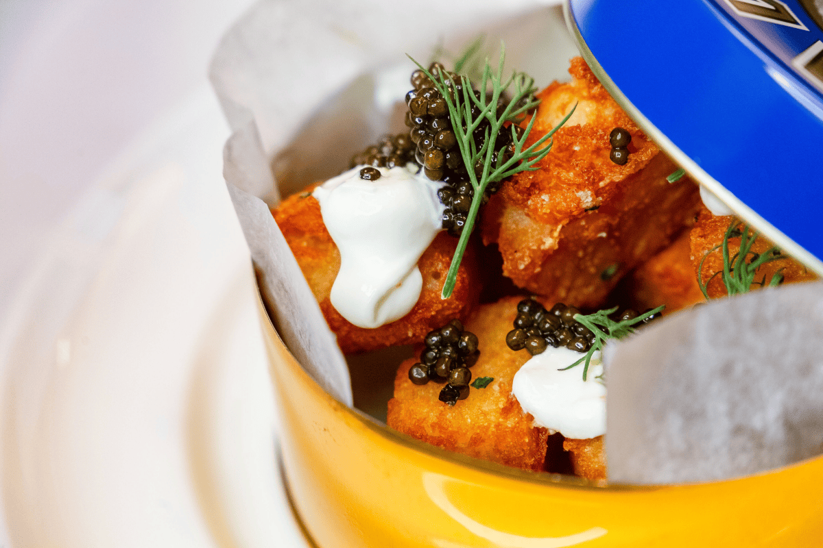 Tater tots are anything but one-dimensional at The Ruxton, where the housemade tots are topped with Kaluga caviar, chives, dill, Gouda and crème fraîche.